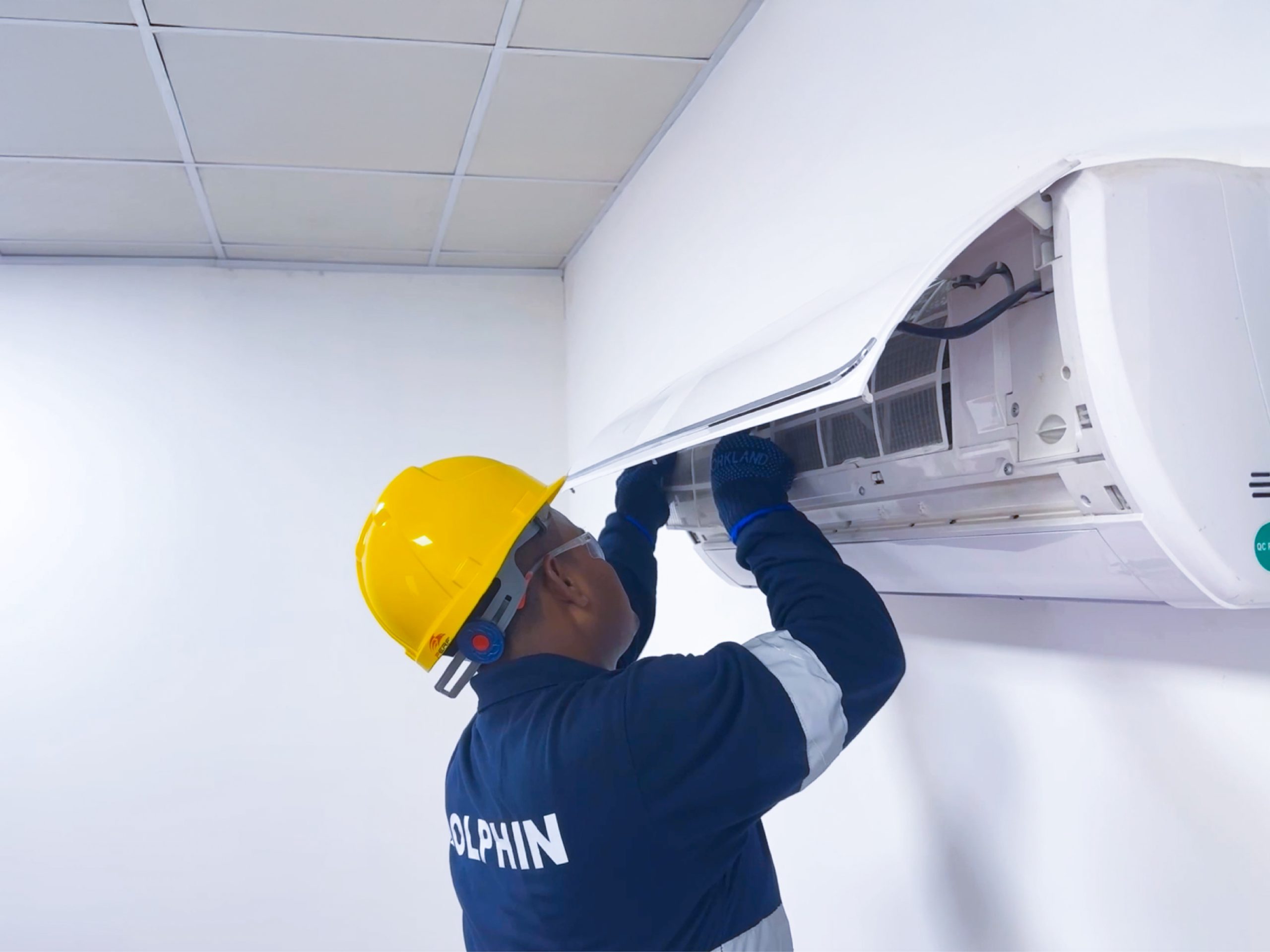 Routine HVAC maintenance with coil cleaning